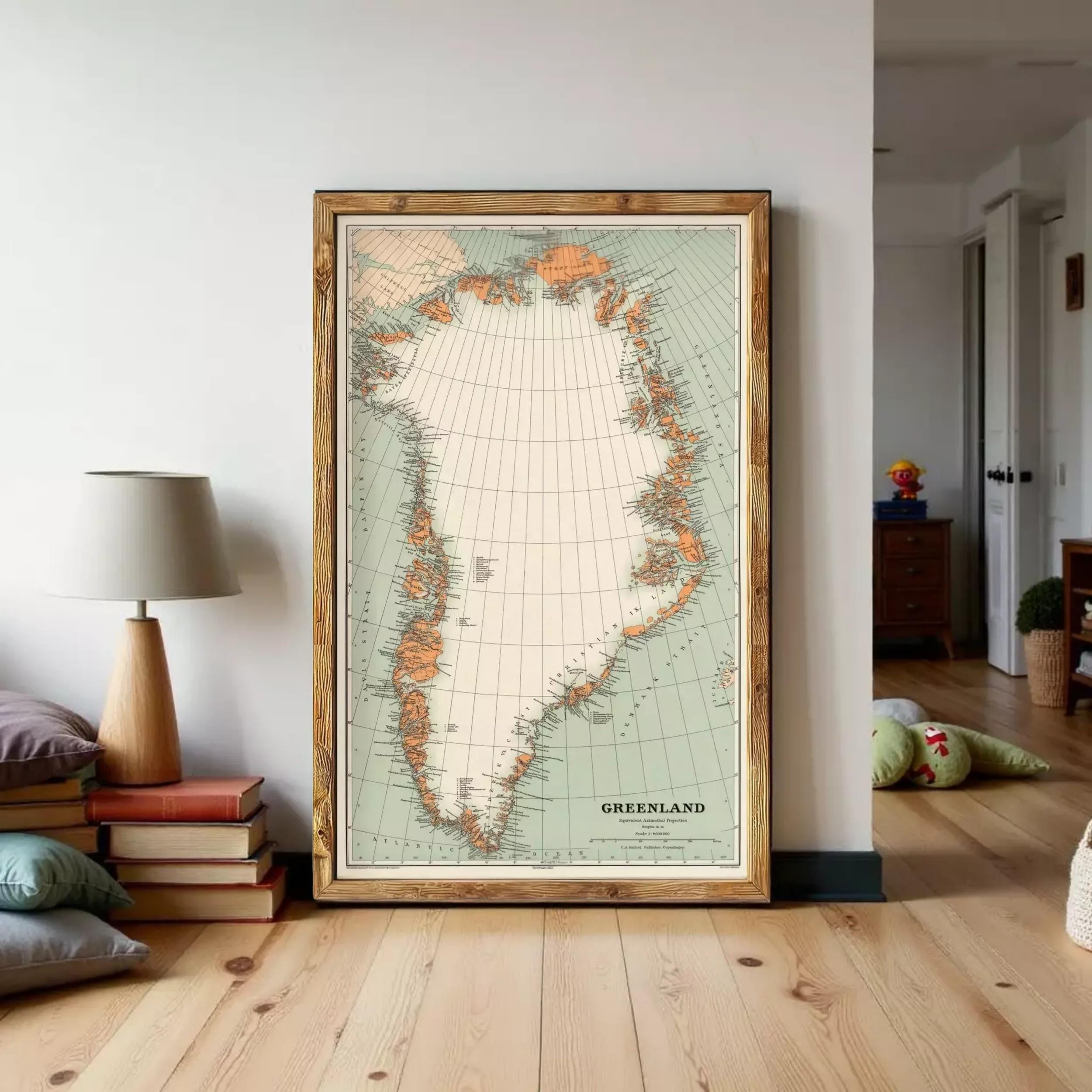 a large framed map of Greenland, with a wooden frame and a light wood floor.