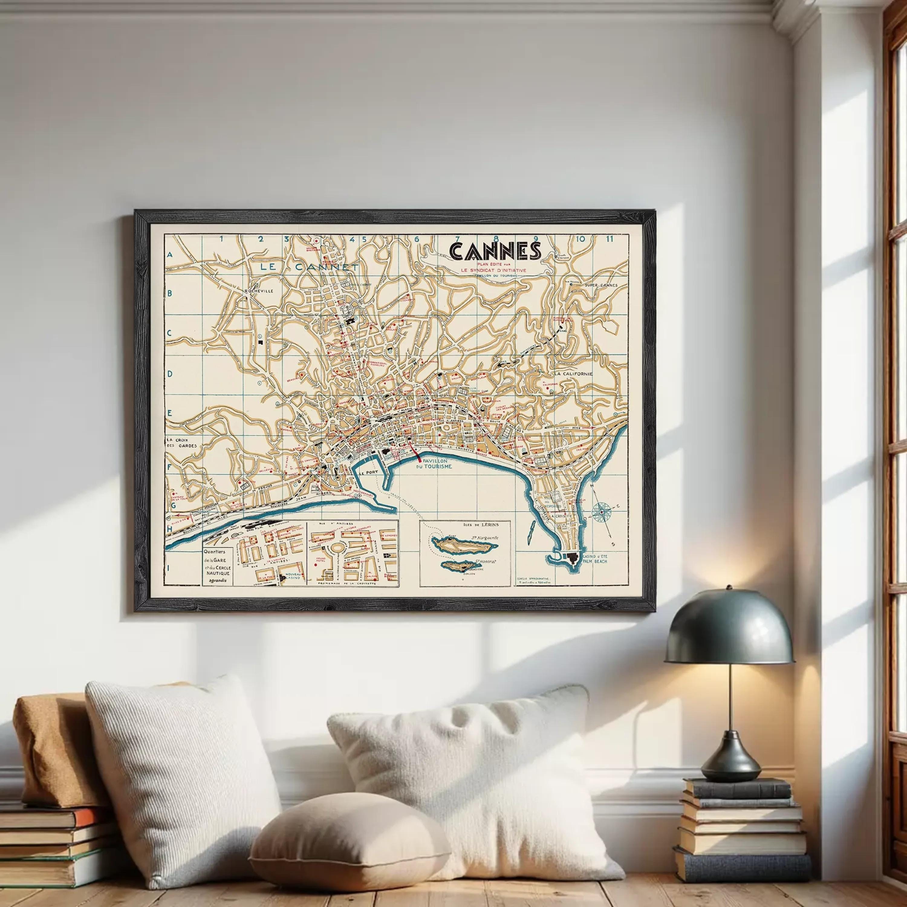 The image is a framed vintage map of the city of Cannes, France, depicting the city's streets, landmarks, and surrounding areas.