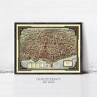 The image is a framed art print depicting a detailed map of a city, likely New York, with various landmarks and streets clearly visible.