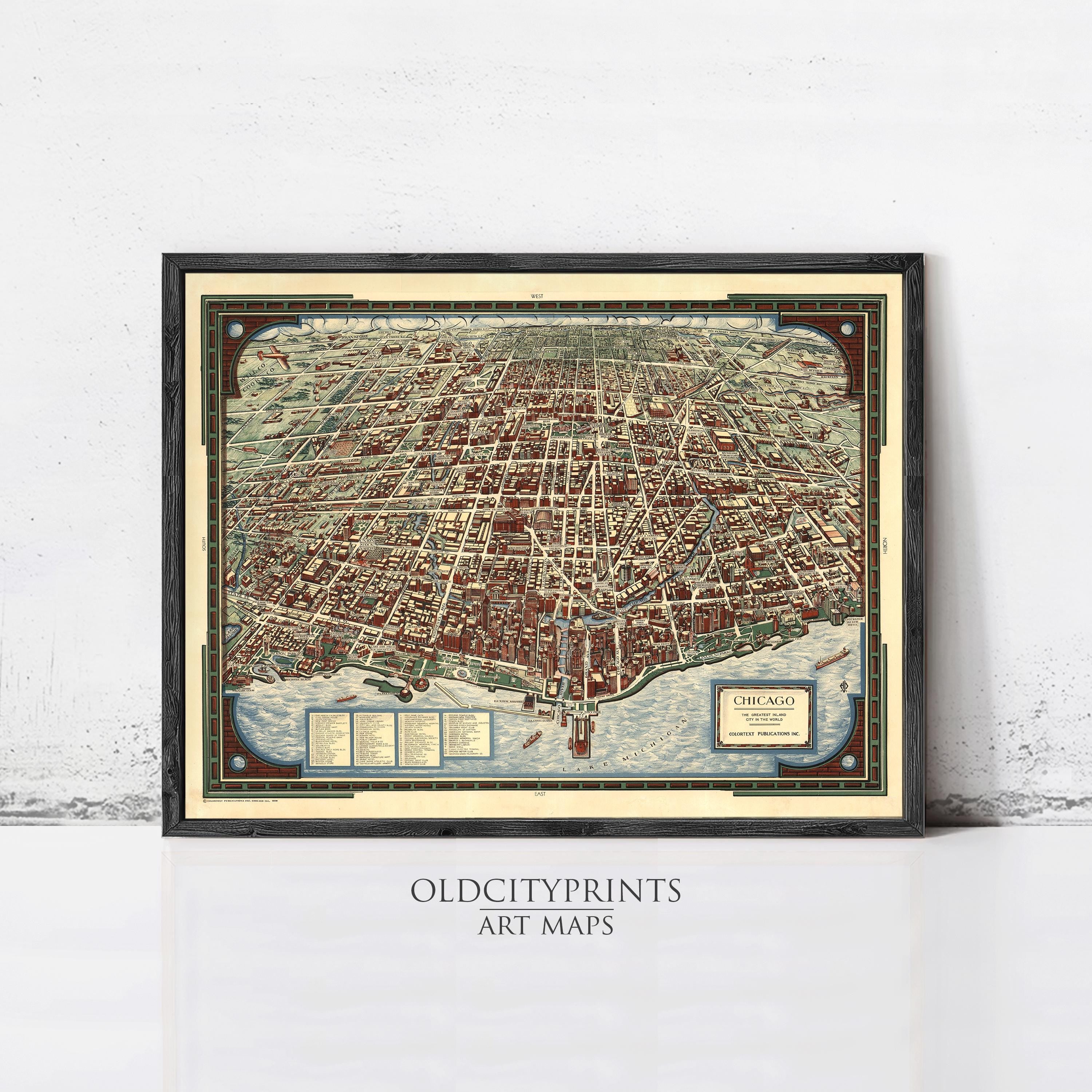 The image is a framed art print depicting a detailed map of a city, likely New York, with various landmarks and streets clearly visible.