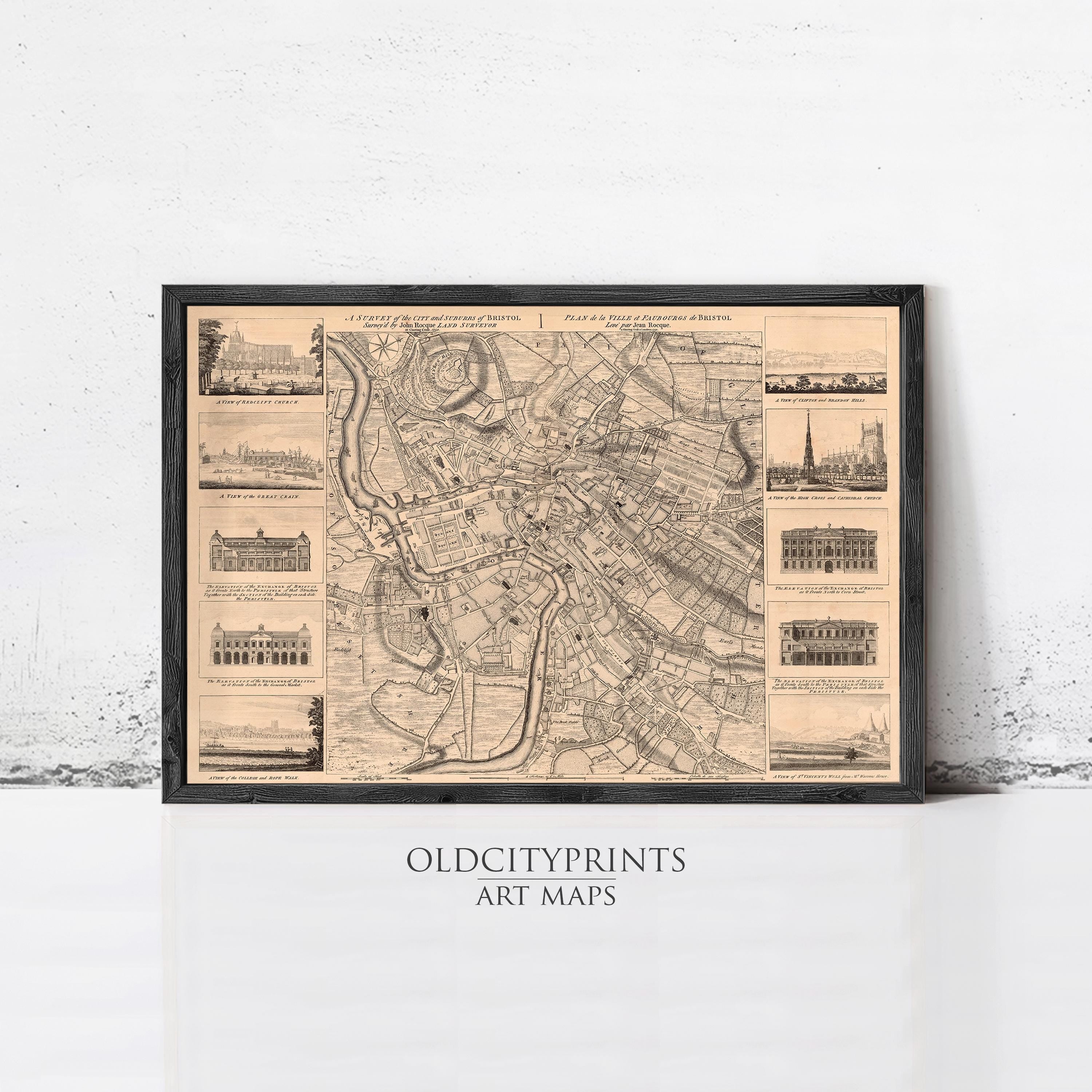The image is a framed art print depicting a detailed map of a city, with various buildings and landmarks labeled.