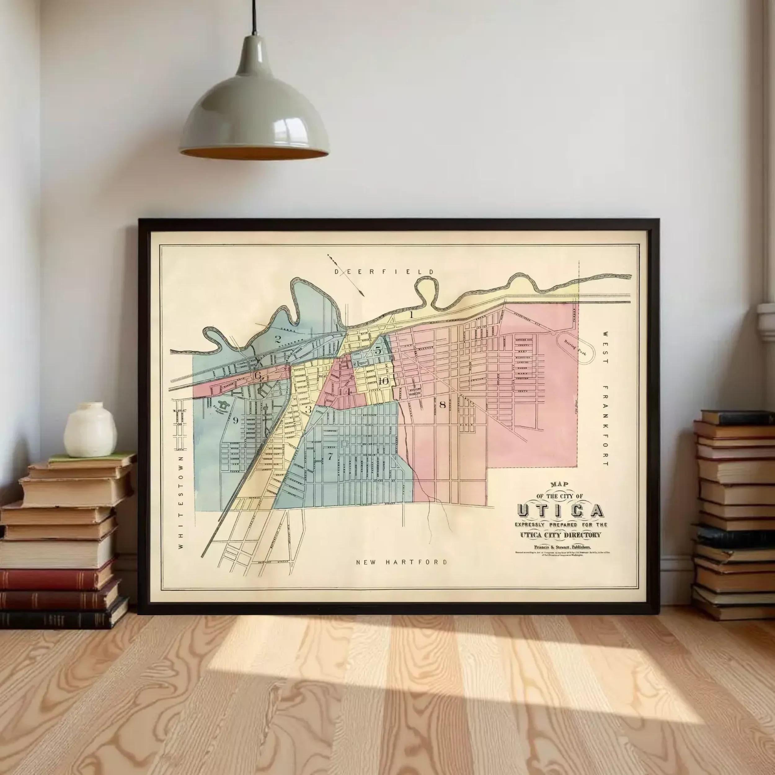 a framed map of Utica, New York, with a vintage style and colorful design.