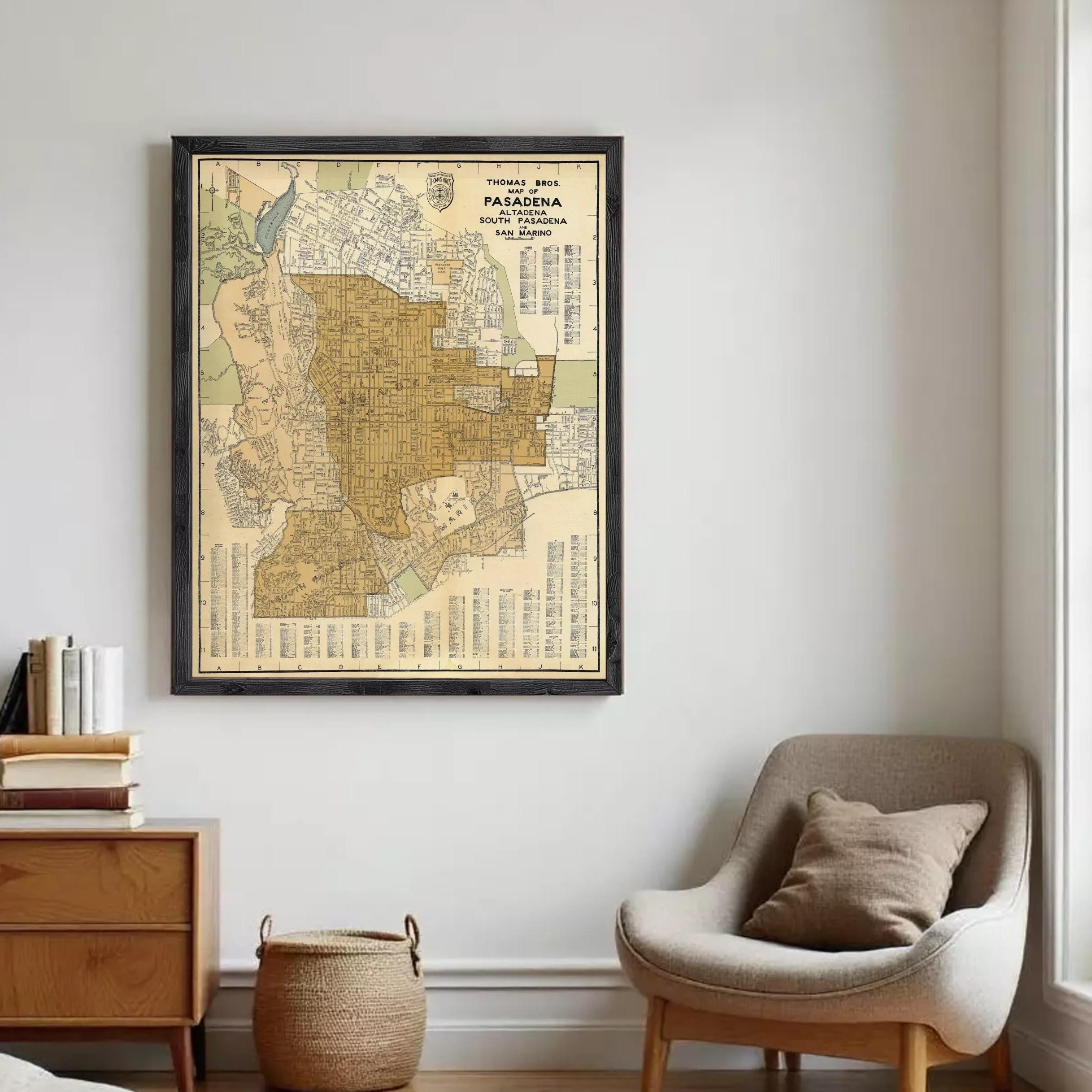 The image is a framed vintage map of the city of Pasadena, California, with a black border and a beige background.