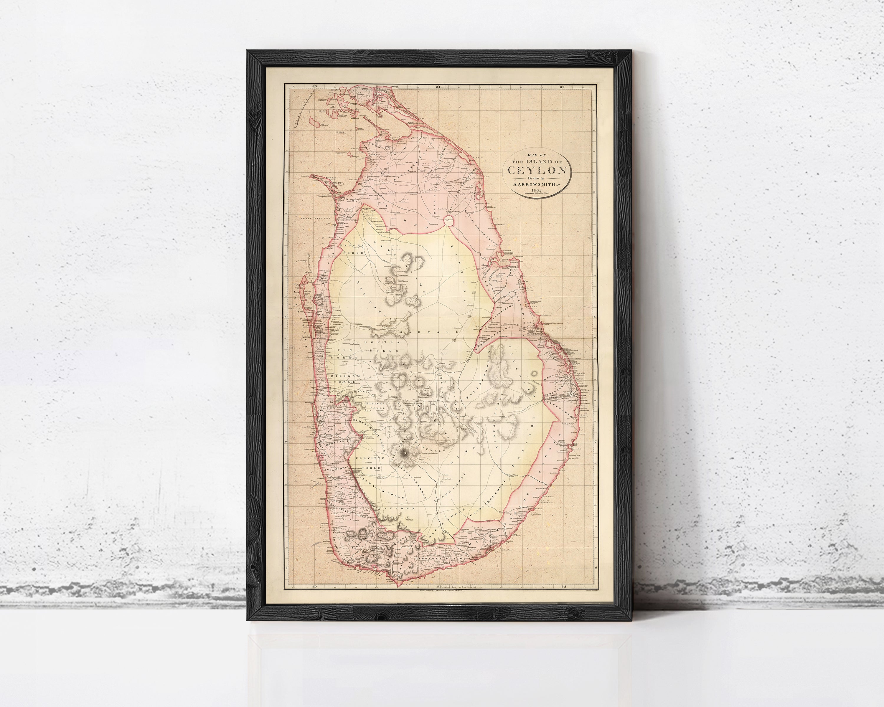 The image is a framed vintage map of Sri Lanka, depicting the country's geographical layout and boundaries.