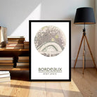 A framed map of Bordeaux, France, with the text "BORDEAUX" and the coordinates "44°50'10" 34°42'W" displayed on it.