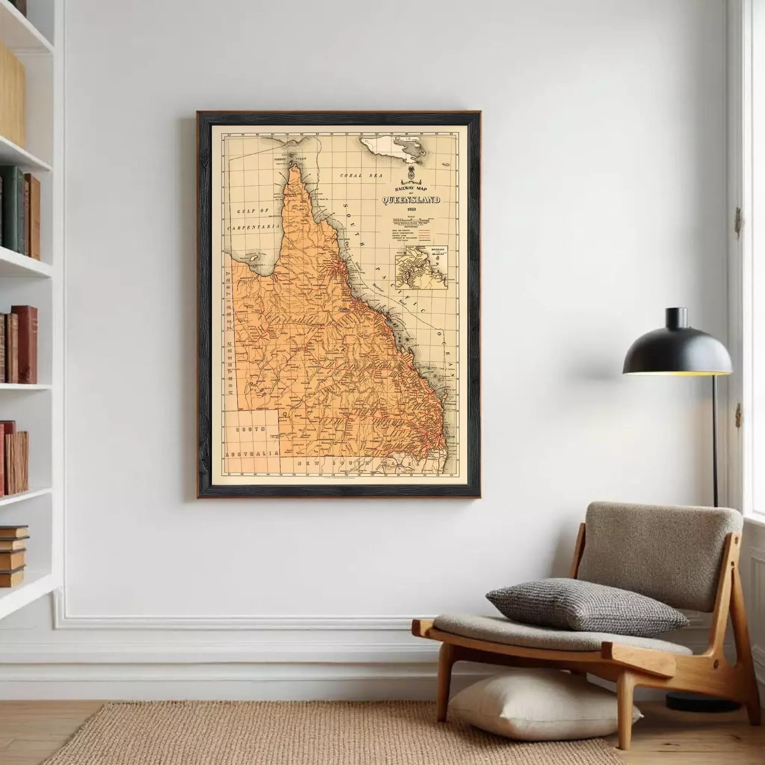 The image is a framed vintage map of the Queensland region of Australia, depicting the state's geographical layout and boundaries.