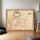 The image is a framed historical map of the city of Paris, France, depicting the layout of the city and its surrounding areas.