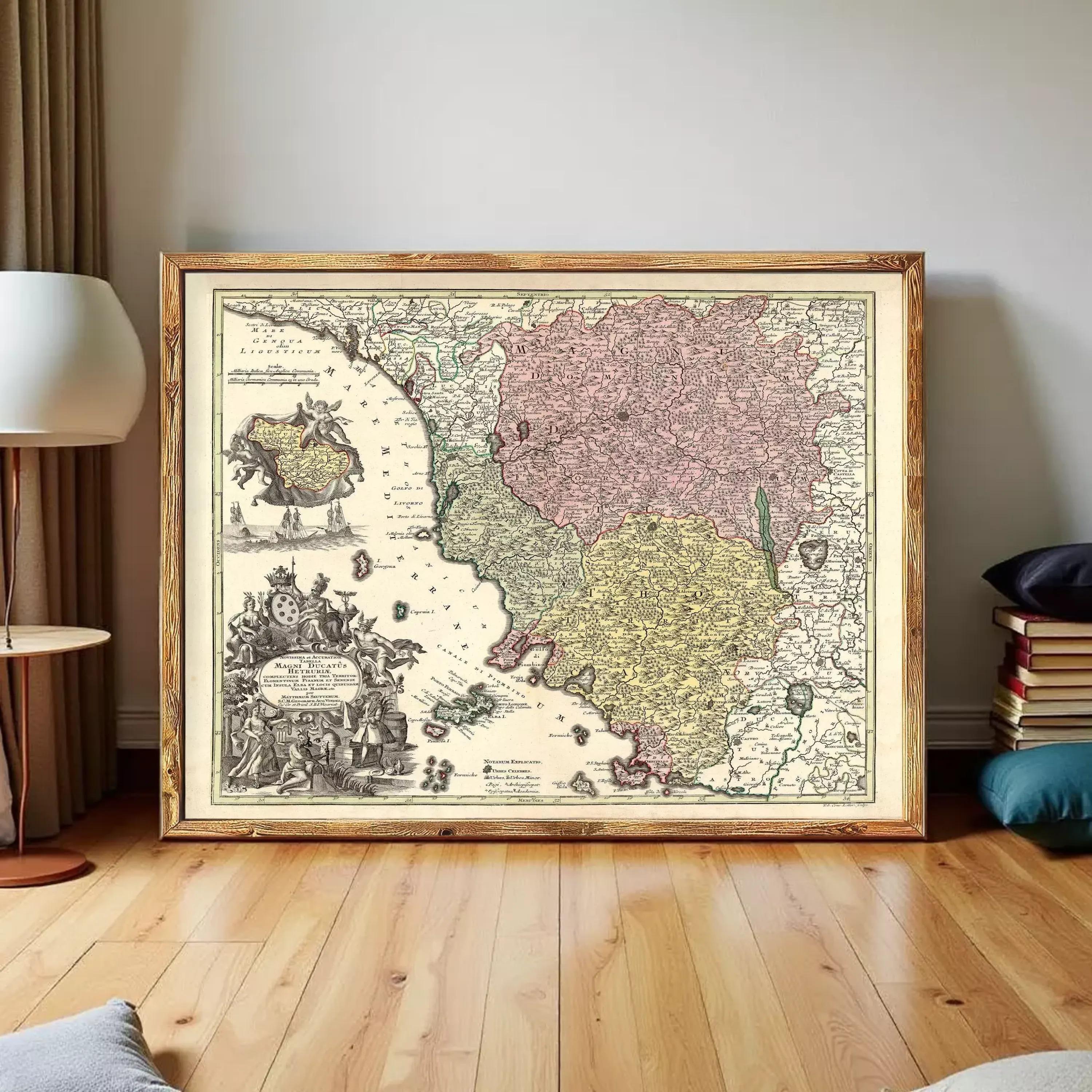 The image is a framed antique map of Europe, featuring detailed illustrations and color-coded regions.