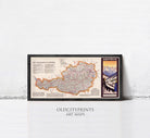 The image is a framed art map of Austria, featuring a detailed map of the country with various regions and landmarks marked.