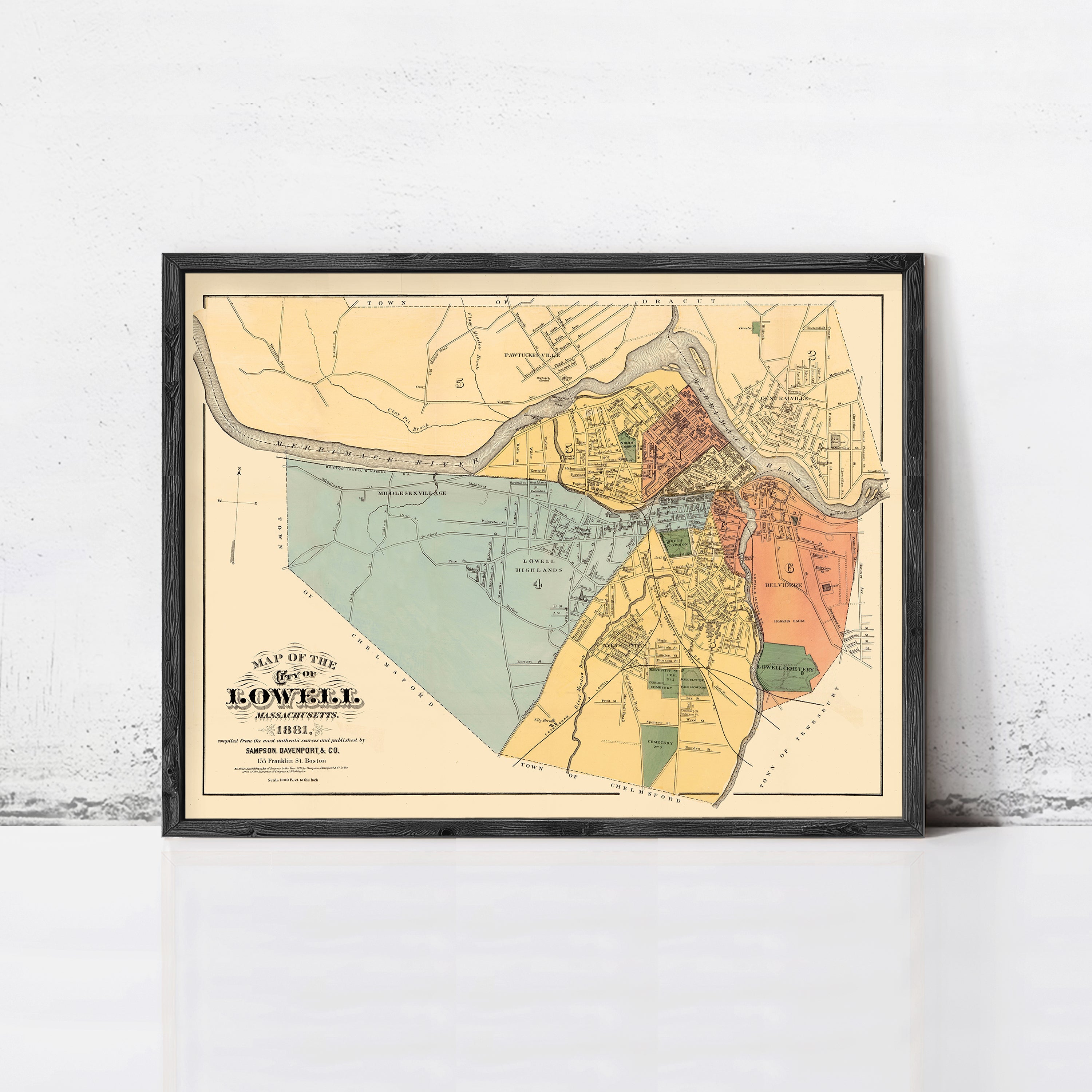 The image is a framed map of the town of Lowell, Massachusetts, dated 1882.