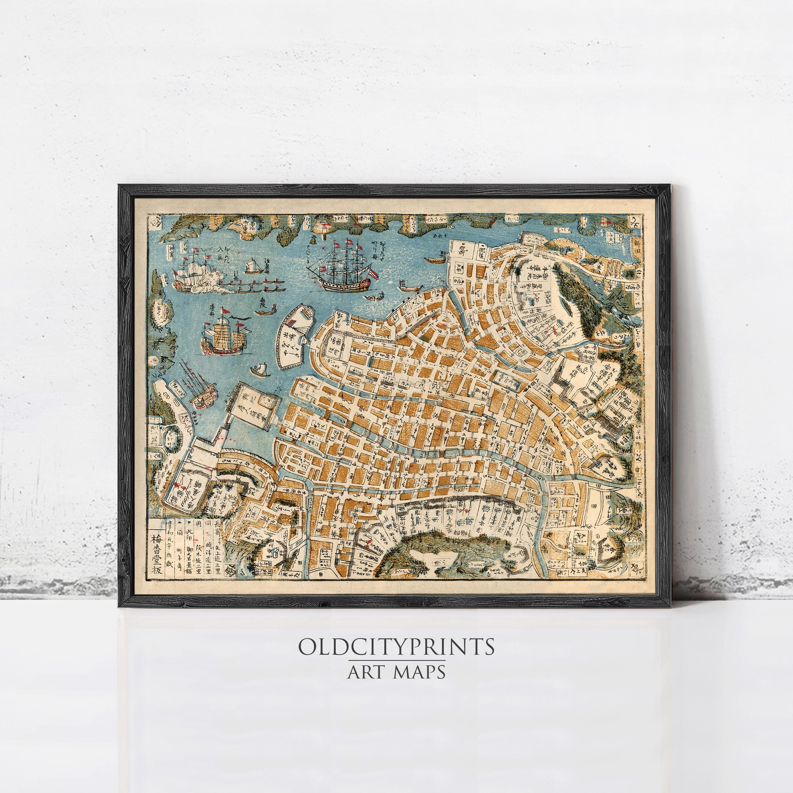 The image is a framed vintage map of a city, likely from the 16th century, with detailed illustrations of ships, buildings, and other landmarks.