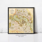 The image is a framed vintage map of a city, depicting various landmarks and streets.