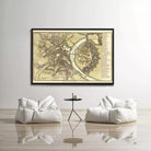 a large framed map of a city hanging on a wall, with two white bean bag chairs positioned in front of it.