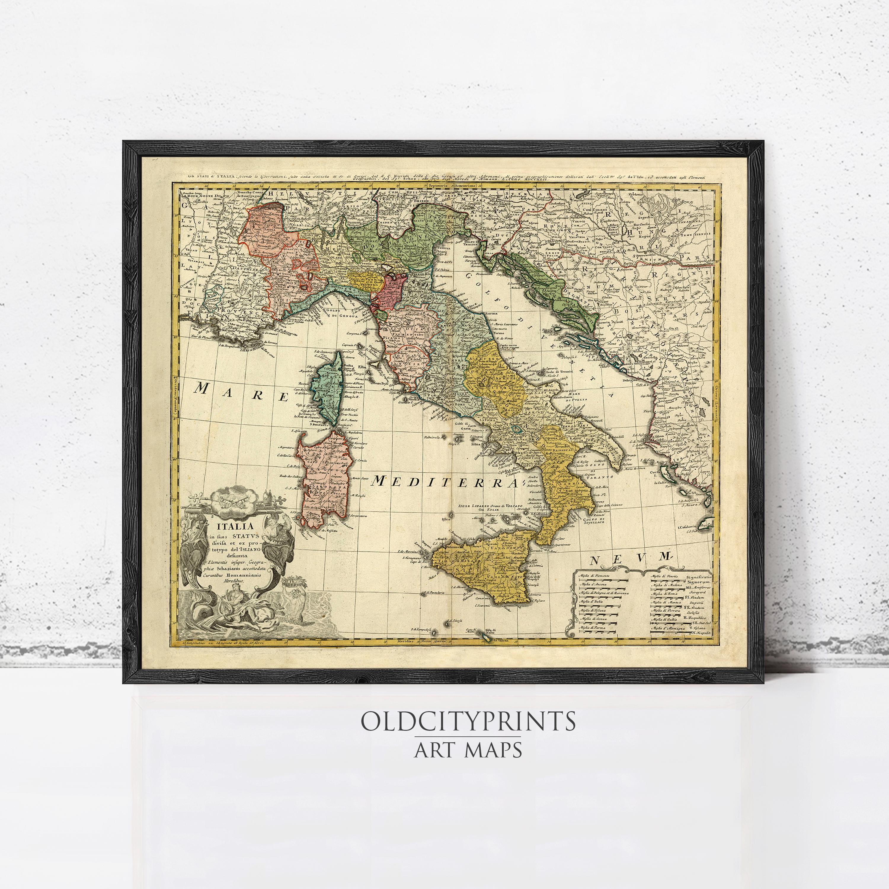 The image is a framed vintage map of Italy, showing the country's geographical layout and surrounding areas.