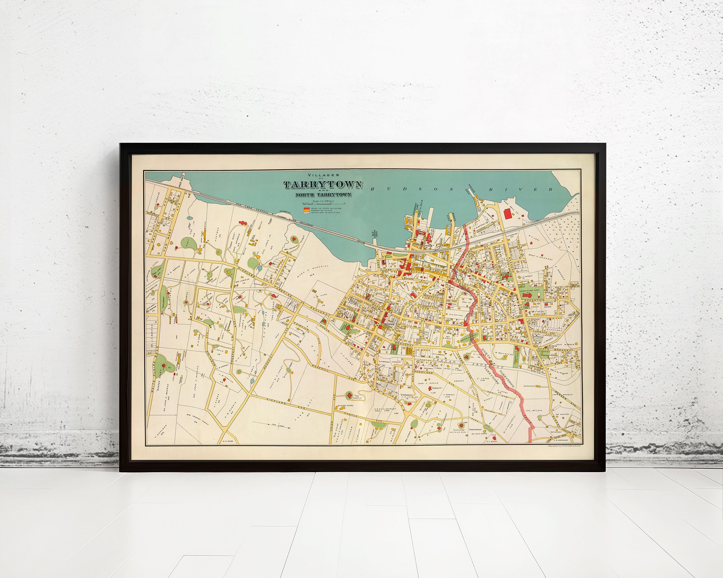 The image is a framed vintage map of Tarrytown, New York, depicting the town's layout and surrounding areas.