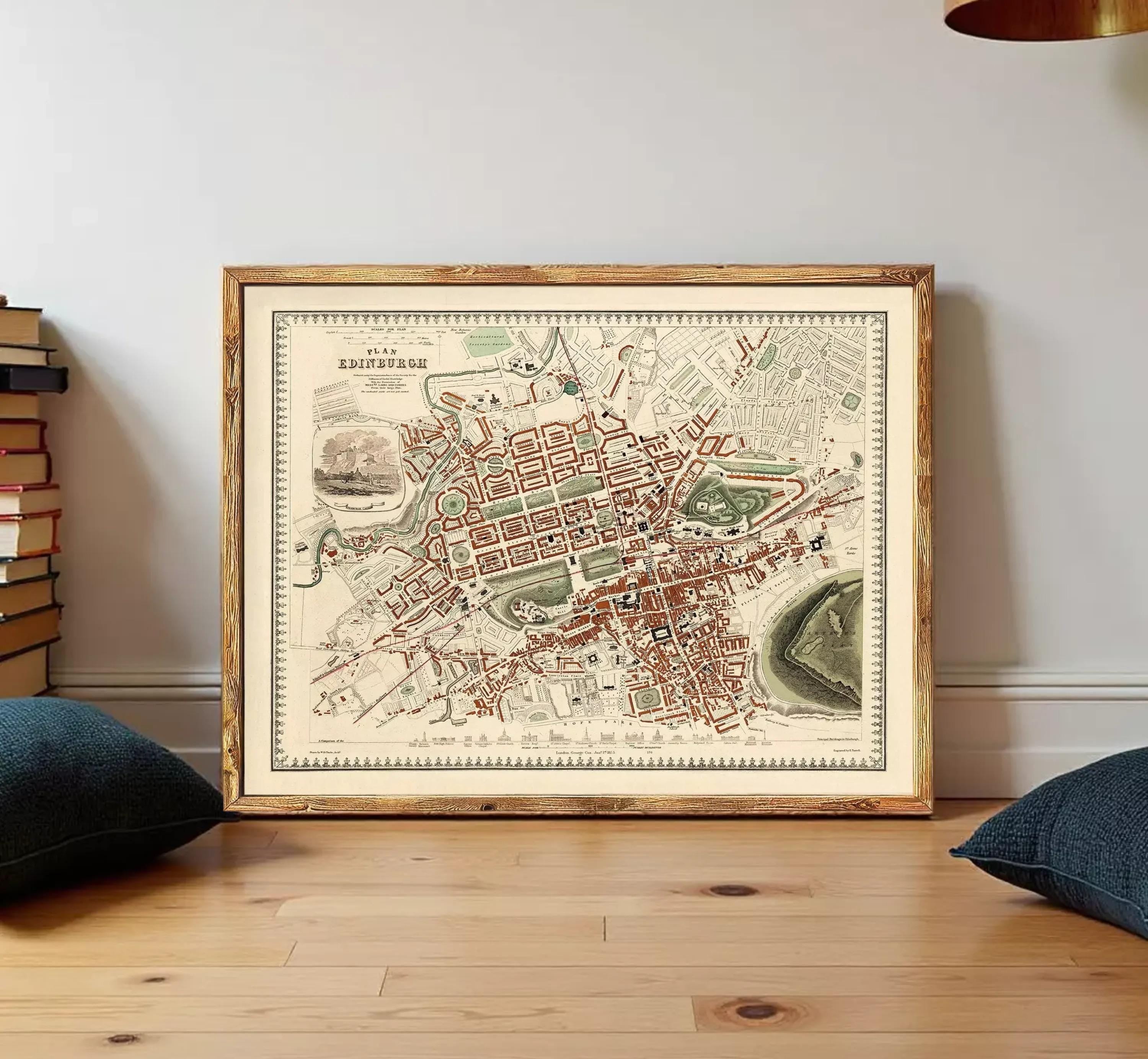 The image is a framed map of a city, likely London, with various landmarks and streets depicted.