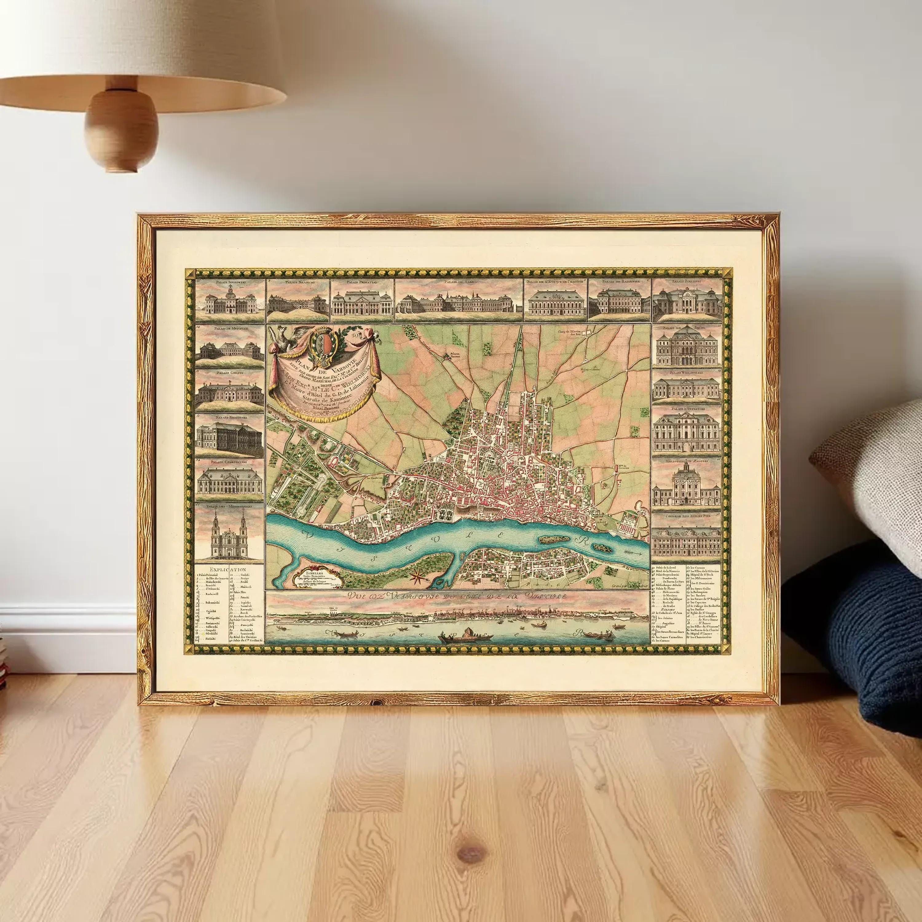 The image is a framed vintage map of a city, depicting various landmarks and buildings in a detailed and intricate manner.