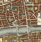 The image is a detailed map of a city, showing streets, buildings, and a river.