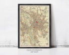 The image is a framed vintage map of Leipzig, Germany, depicting the city's streets and surrounding areas.