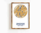 The image is a framed print of a map of Avignon, France, with the city's name and coordinates displayed.