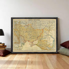 The image is a framed vintage map of the Middle East and North Africa region, depicting the countries and their borders in a detailed and colorful manner.