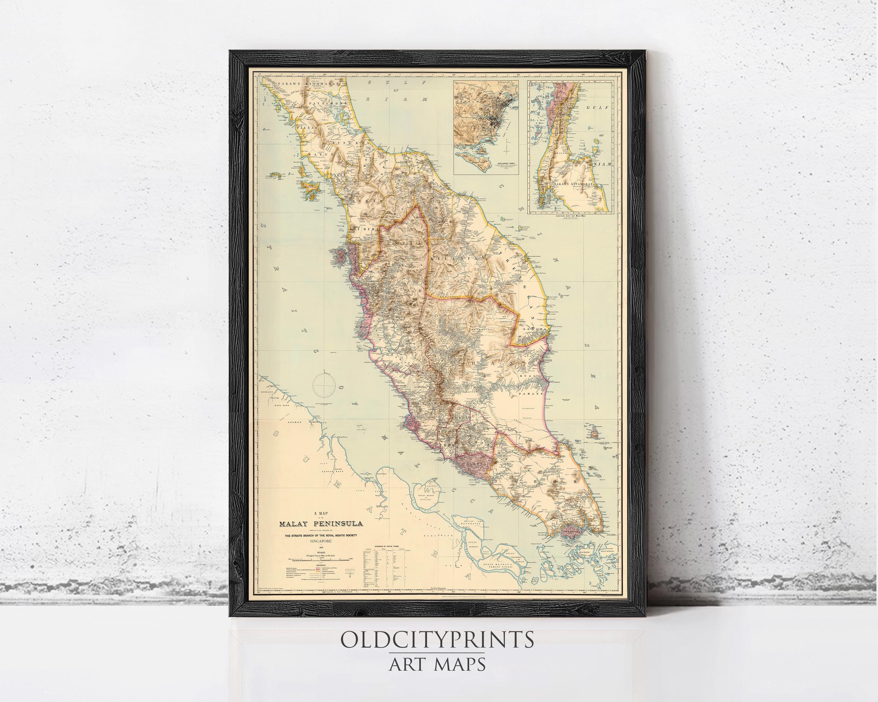 The image is a framed vintage map of Malaysia, specifically the Malay Peninsula, with a black border and a white background.