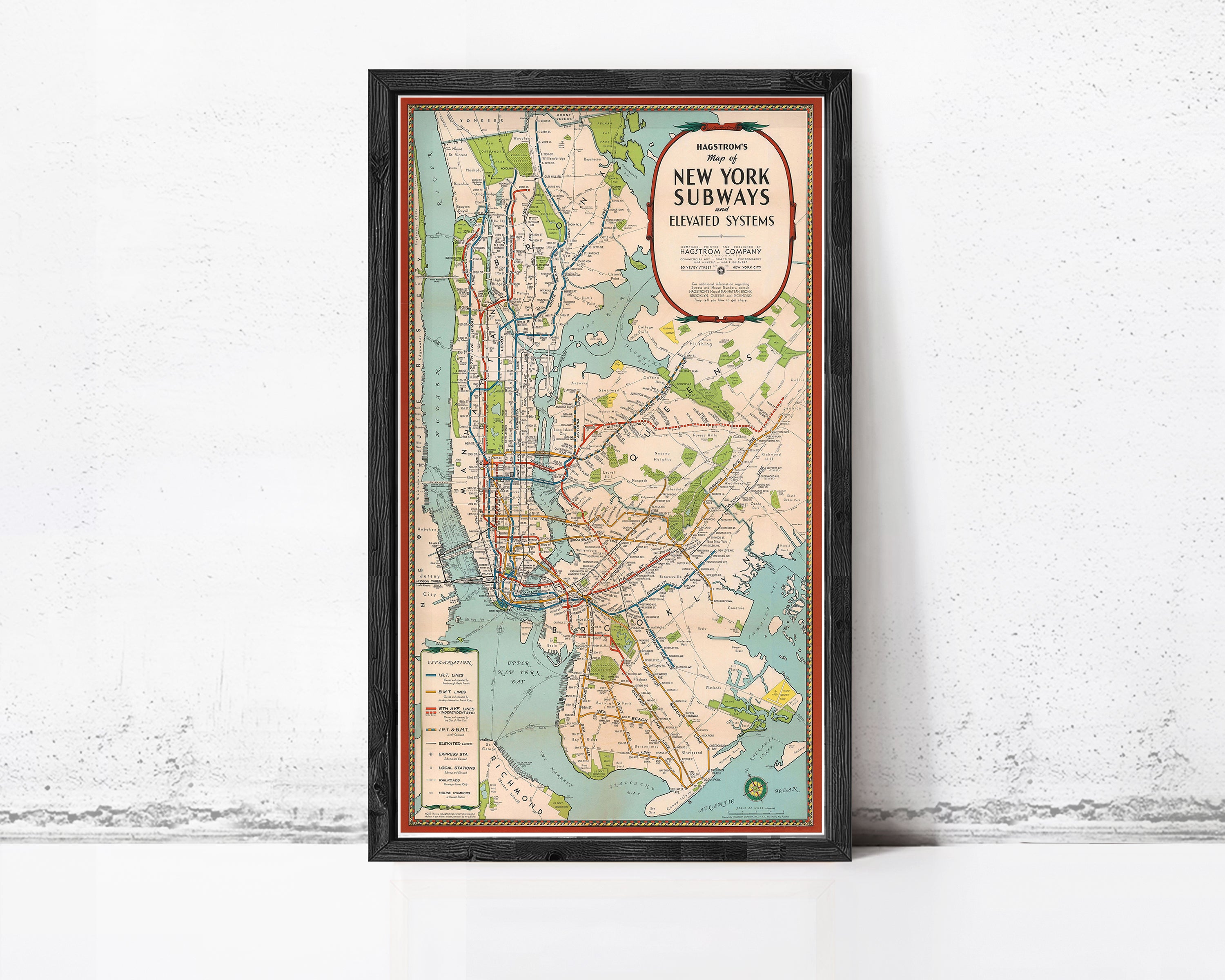 The image is a framed subway map of New York City, depicting the city's subway system.