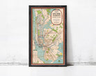 The image is a framed subway map of New York City, depicting the city's subway system.