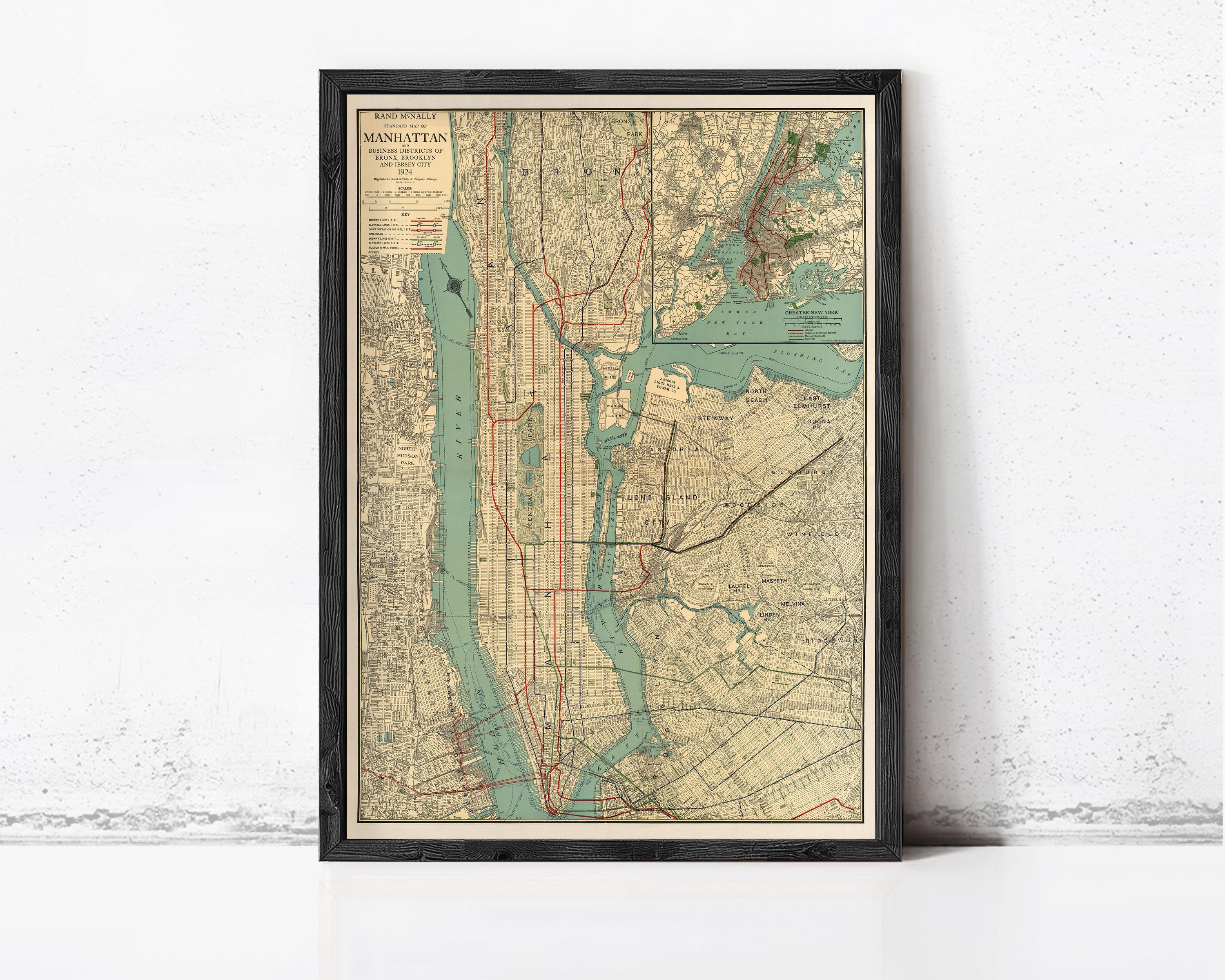 A framed vintage map of Manhattan, New York, depicting the city's streets, waterways, and surrounding areas.