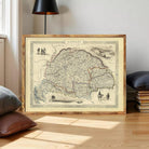 The image is a framed map of Hungary, depicting various landmarks and regions within the country.
