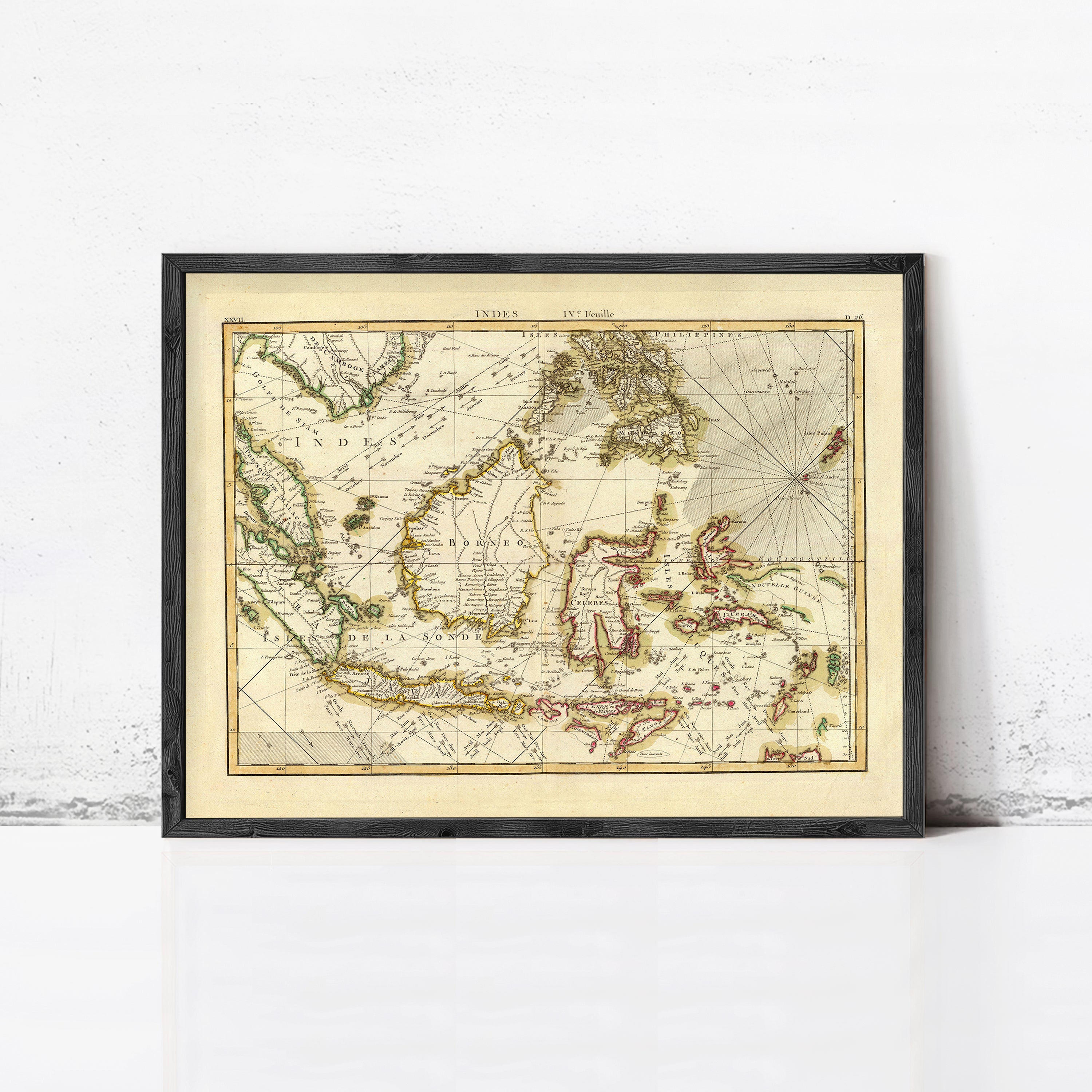 The image is a framed antique map of the world, depicting the continents and oceans in a detailed and intricate manner.