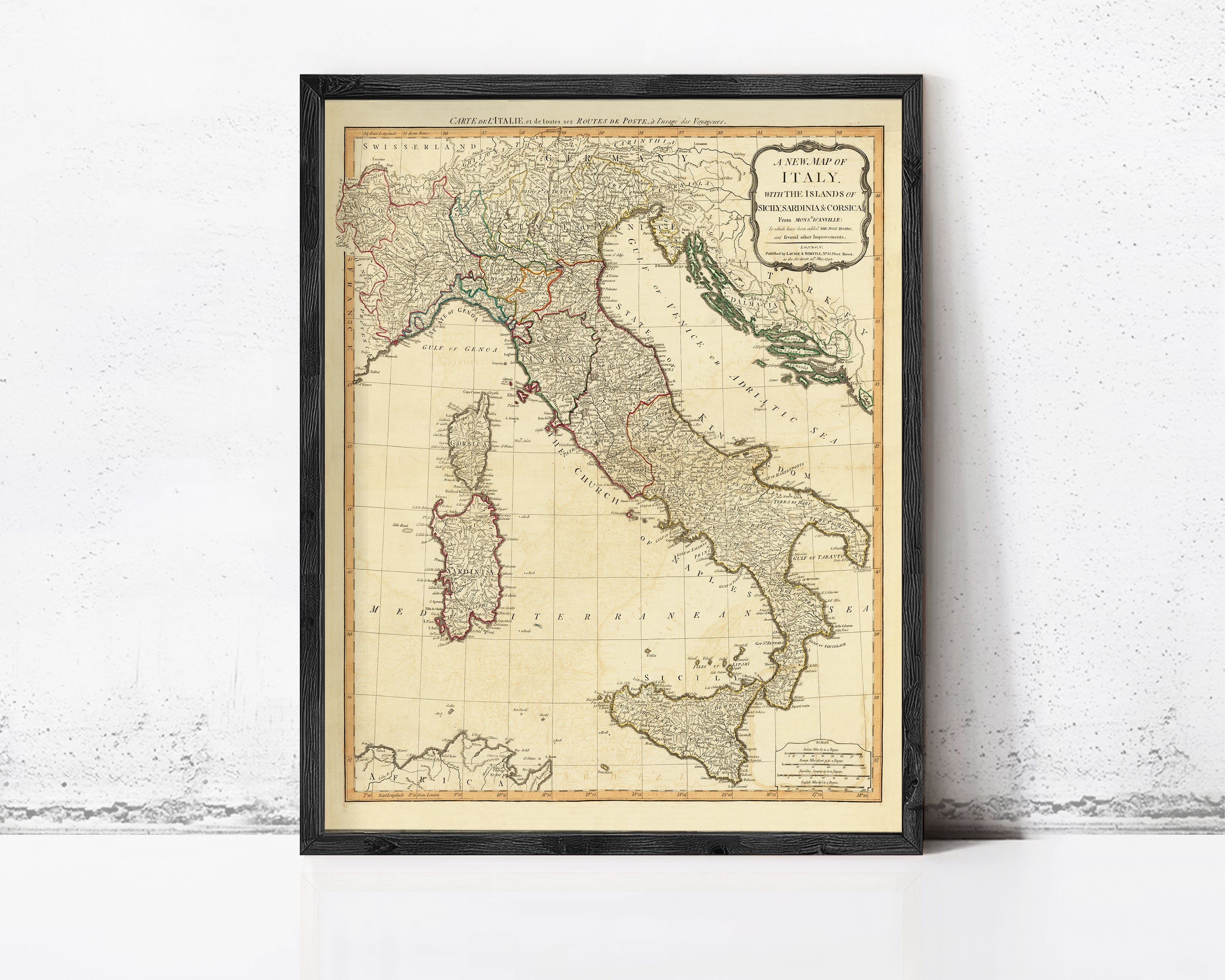 The image is a framed map of Italy, showing the country's geographical layout and surrounding areas.