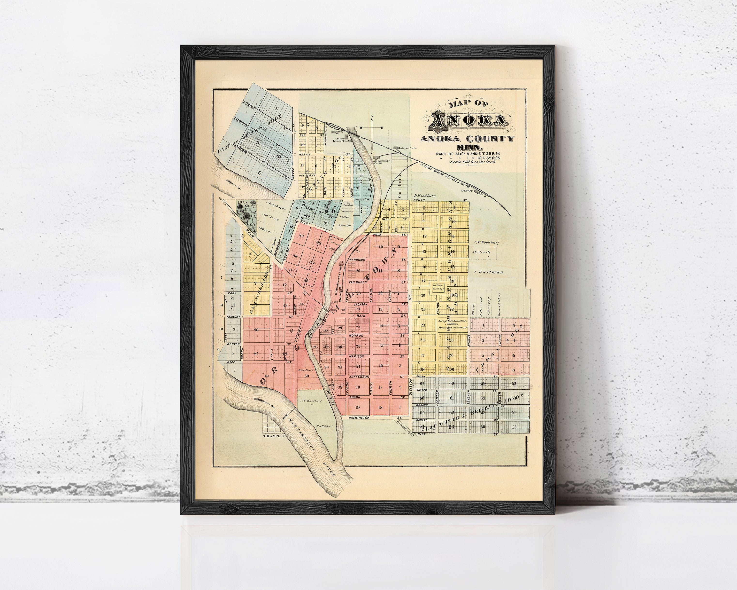 The image is a framed map of the town of Anoka, Minnesota, showing the layout of the town and surrounding areas.