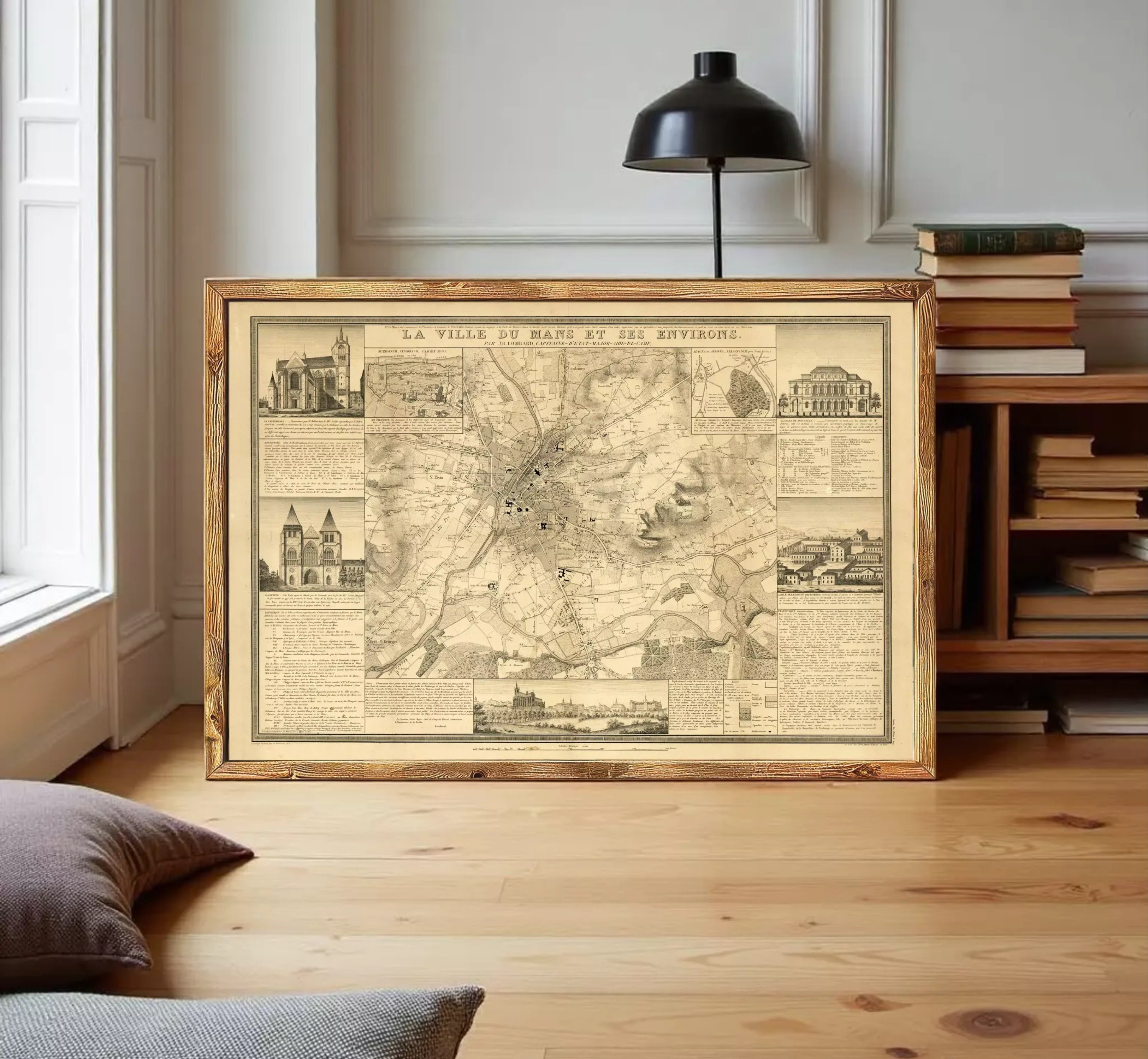 The image is a framed vintage map of a city, likely Paris, with various landmarks and streets depicted.