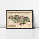 The image is a framed vintage map of Jamaica, depicting the island's geographical layout and surrounding areas.