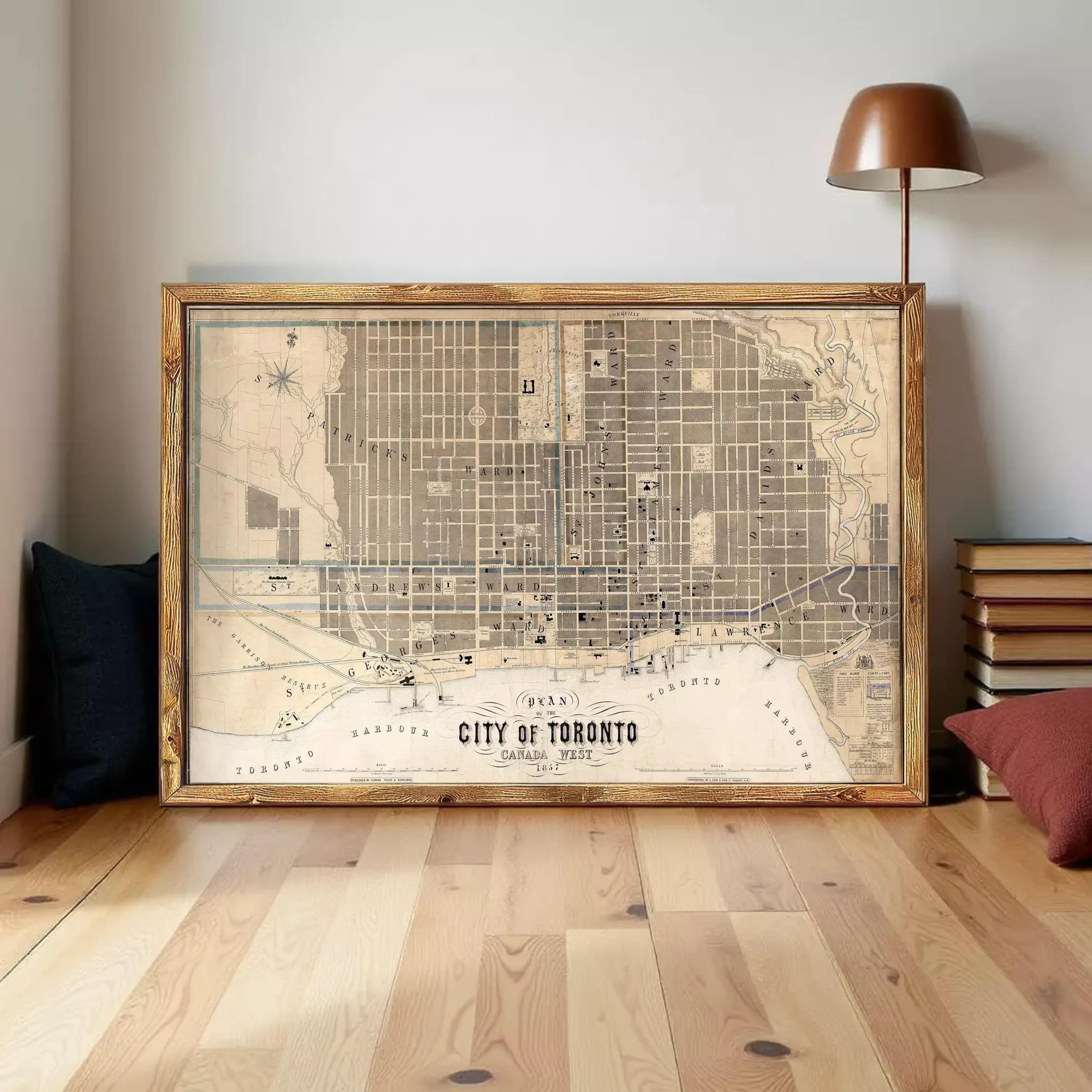 A framed map of Toronto, Canada, depicting the city's streets and landmarks.