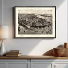 a framed black and white illustration of New York City, depicting the cityscape with boats on the water.