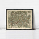 The image is a framed antique map of a city, likely Rome, with detailed street maps and landmarks.