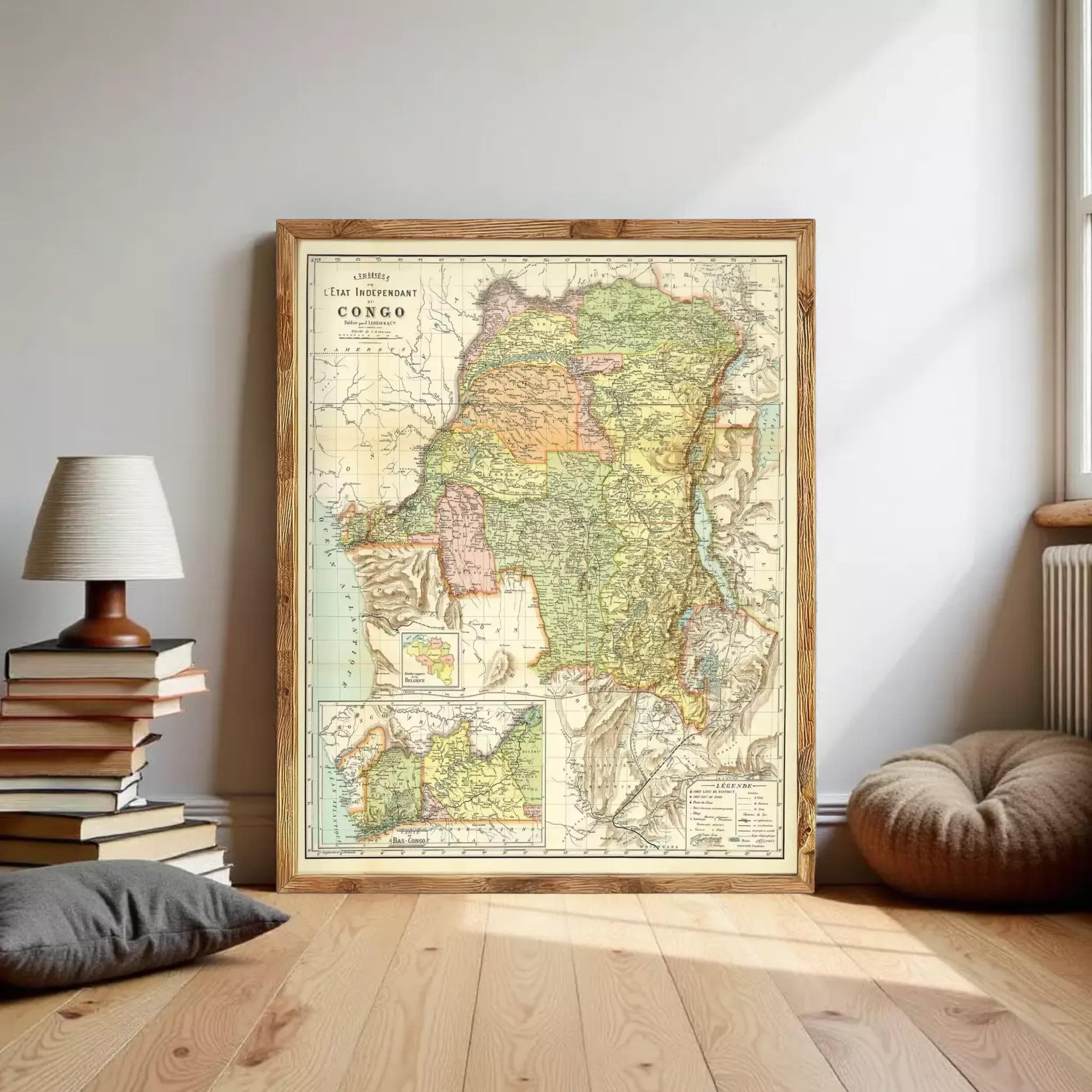 The image is a vintage map of the Congo, framed and displayed on a white wall.