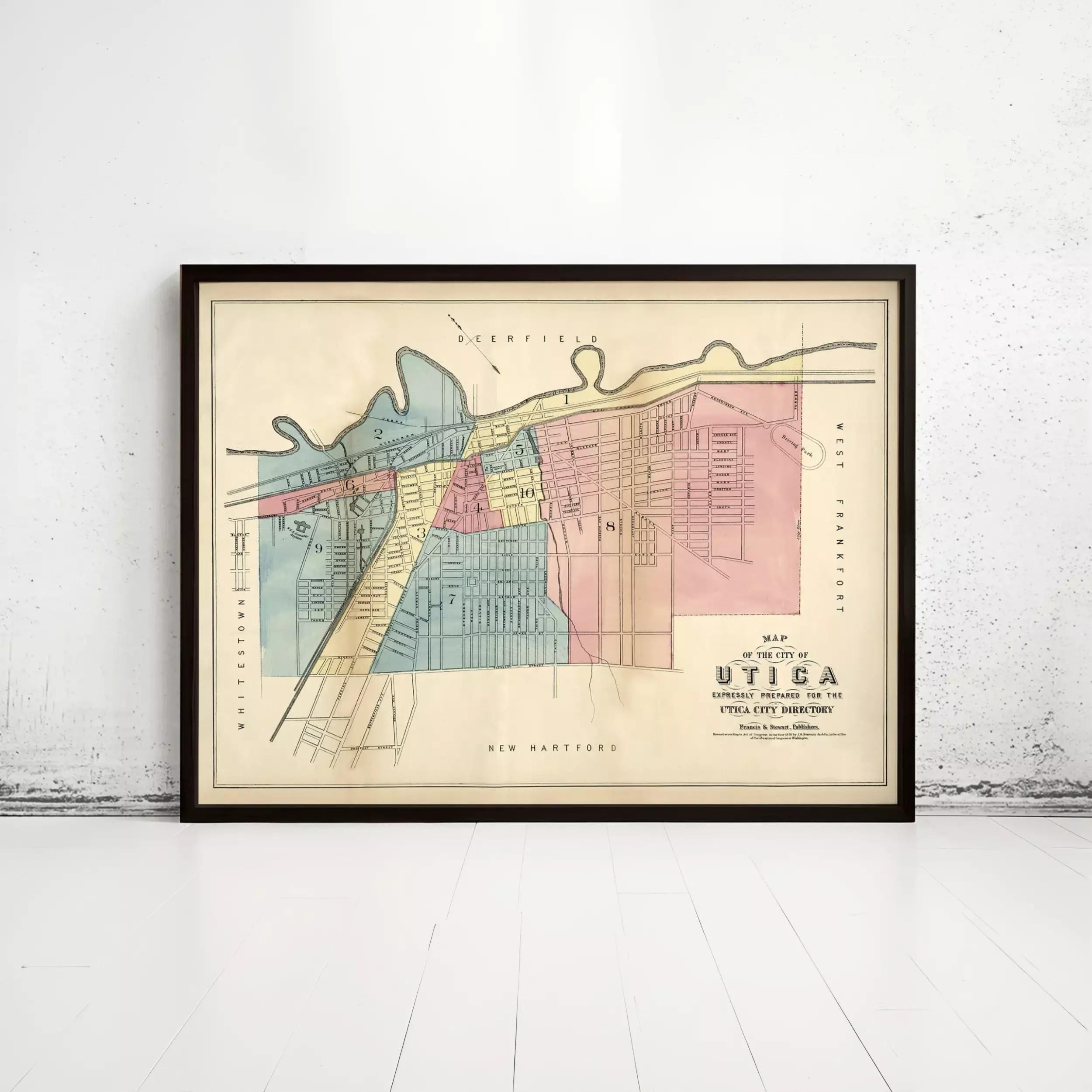 The image is a framed map of Utica, New York, depicting the city's streets and neighborhoods.