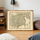 The image is a framed antique map of China, depicting the country's geographical layout and boundaries.
