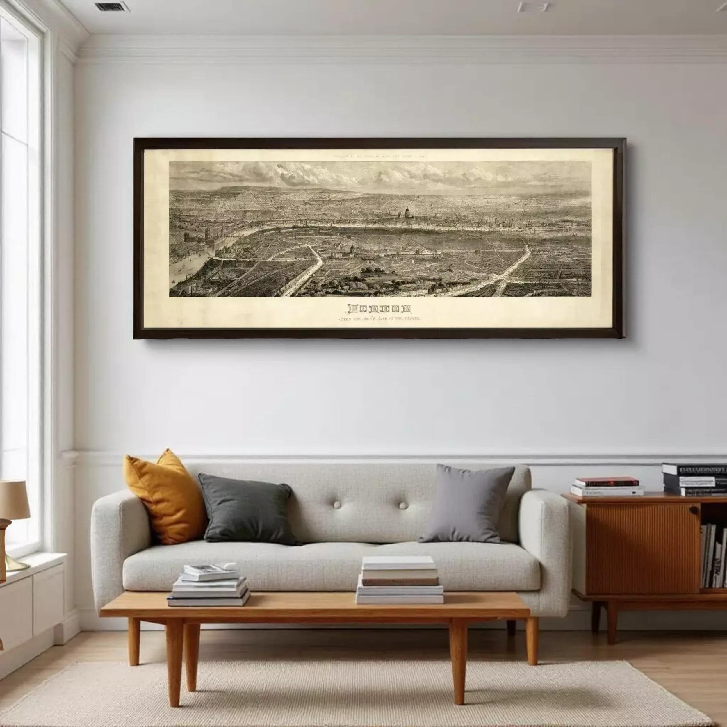 A framed black and white aerial map of a city or region, depicting a detailed view of the landscape and surrounding areas.