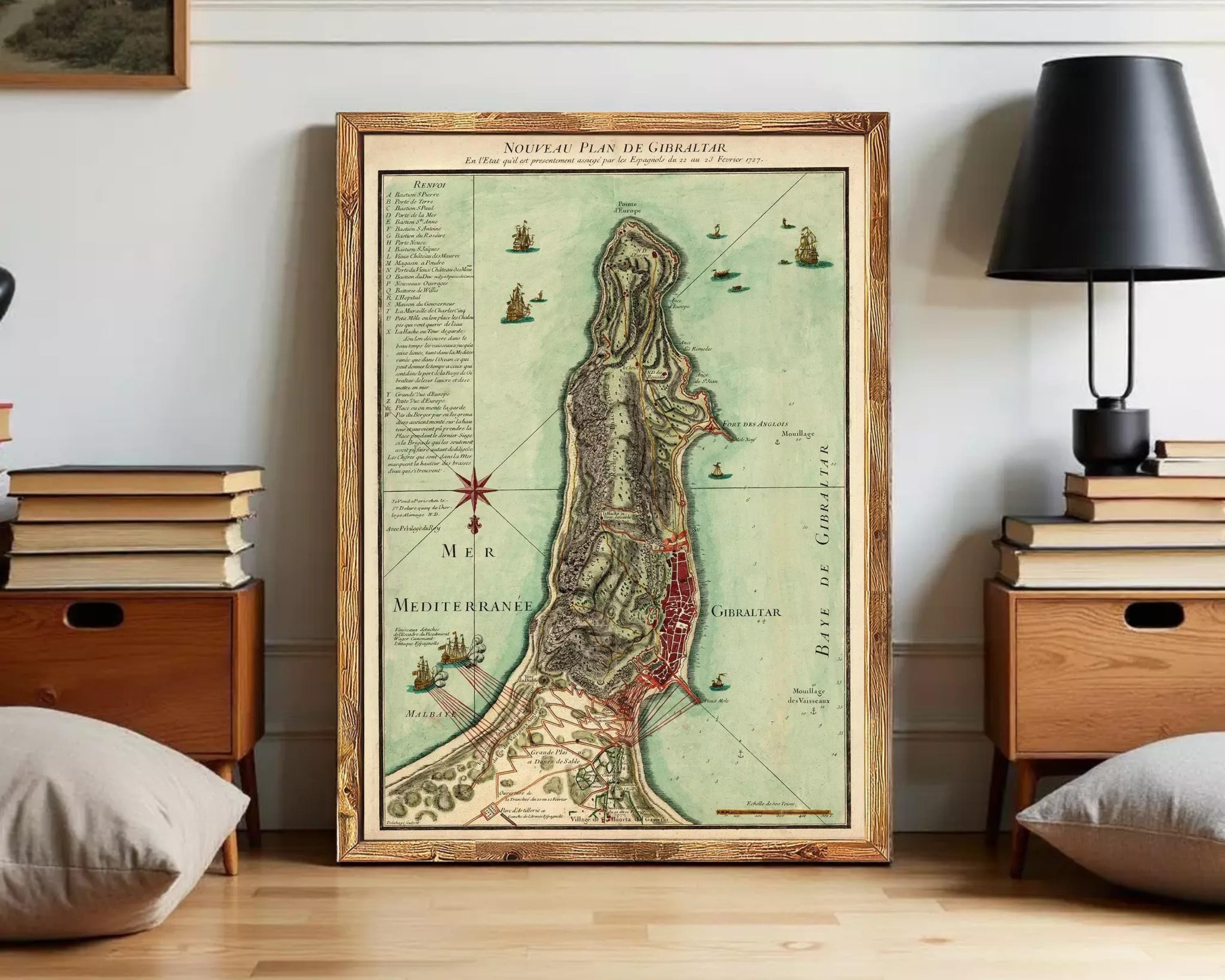 The image is a framed map of the island of Gibraltar, showing the surrounding areas and the coastline.