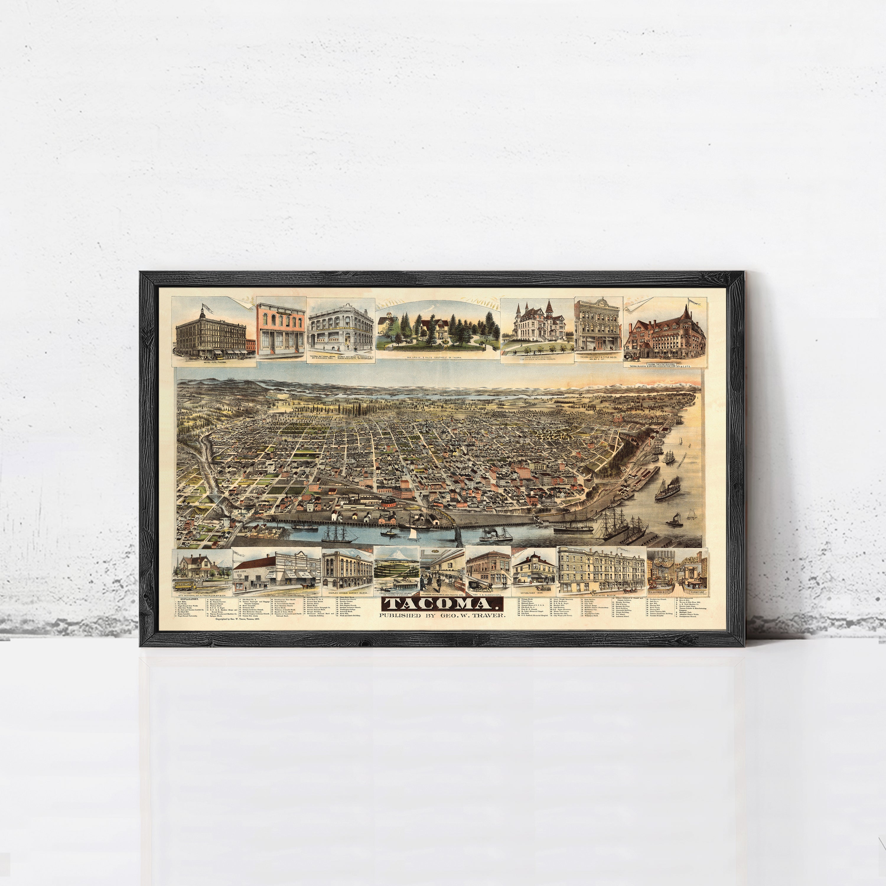 The image is a framed vintage map of Tacoma, Washington, depicting various buildings and landmarks across the city.