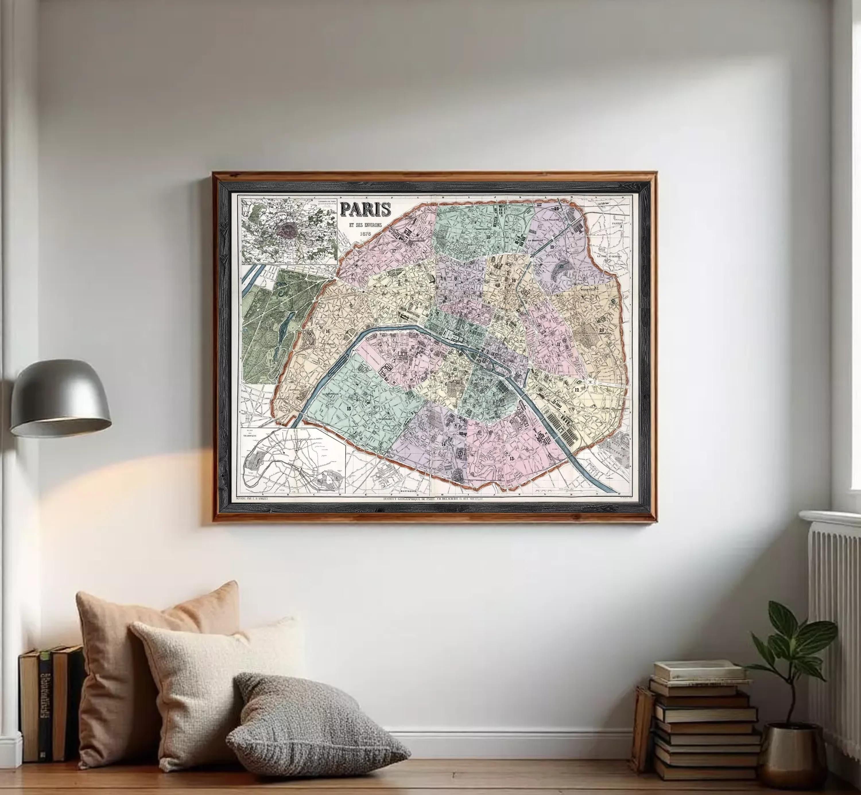 The image is a framed vintage map of Paris, France, depicting the city's streets and neighborhoods in a detailed and colorful manner.