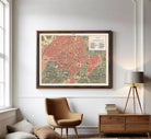 The image is a framed map of the city of Athens, Greece, depicting the city's streets, landmarks, and surrounding areas.