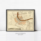 The image is a framed vintage map of a city, likely from the 19th century, depicting a detailed layout of the city's streets, landmarks, and surrounding areas.
