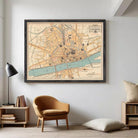 The image is a framed vintage map of the city of Paris, France, depicting the city's streets, landmarks, and surrounding areas.