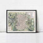 The image is a framed map of a city, likely displaying a detailed layout of streets, landmarks, and other geographical features.
