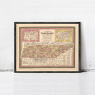 A framed vintage map of Tennessee, showing the state's geographical layout and boundaries.
